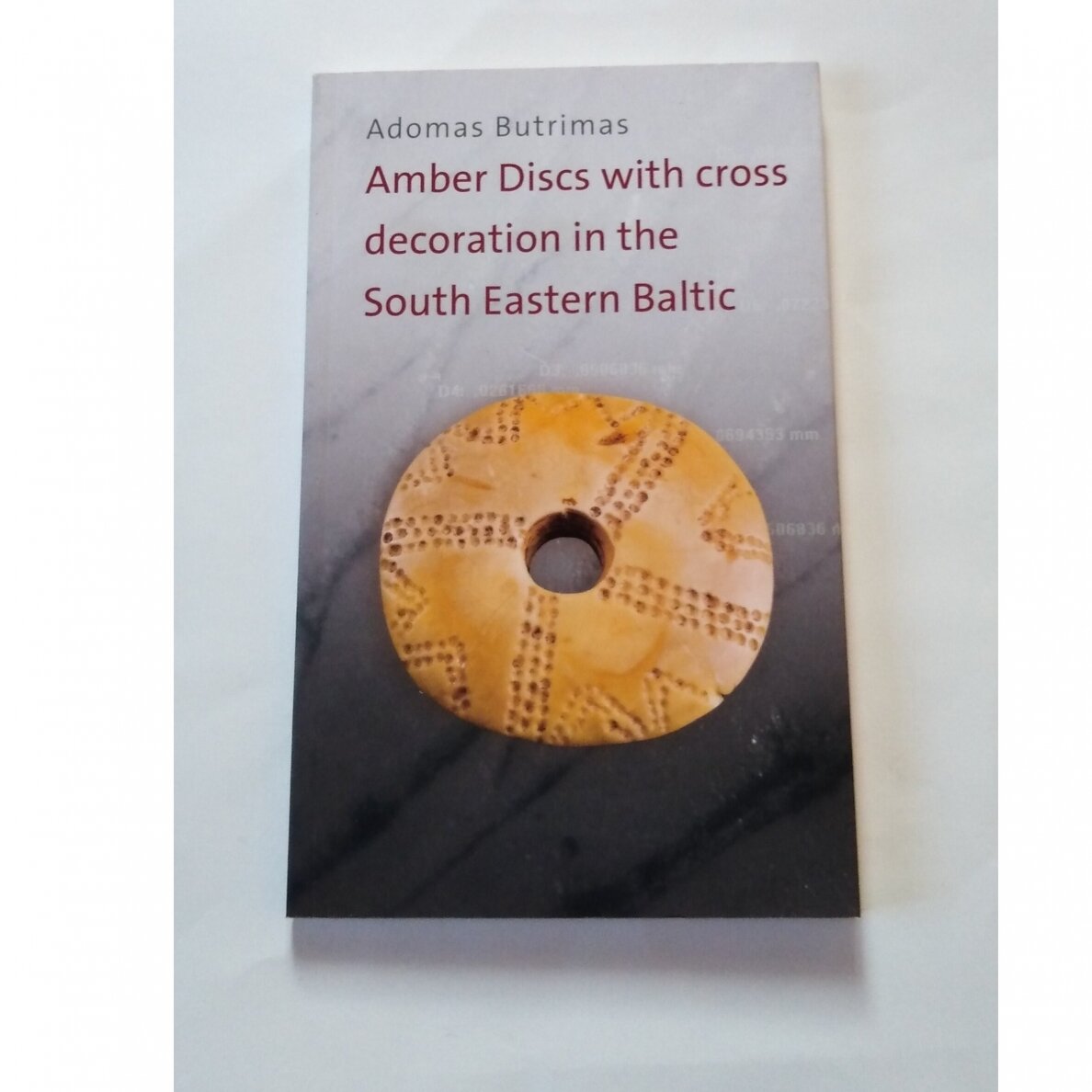 Amber Discs with cross decoration in the South Eastern Baltic